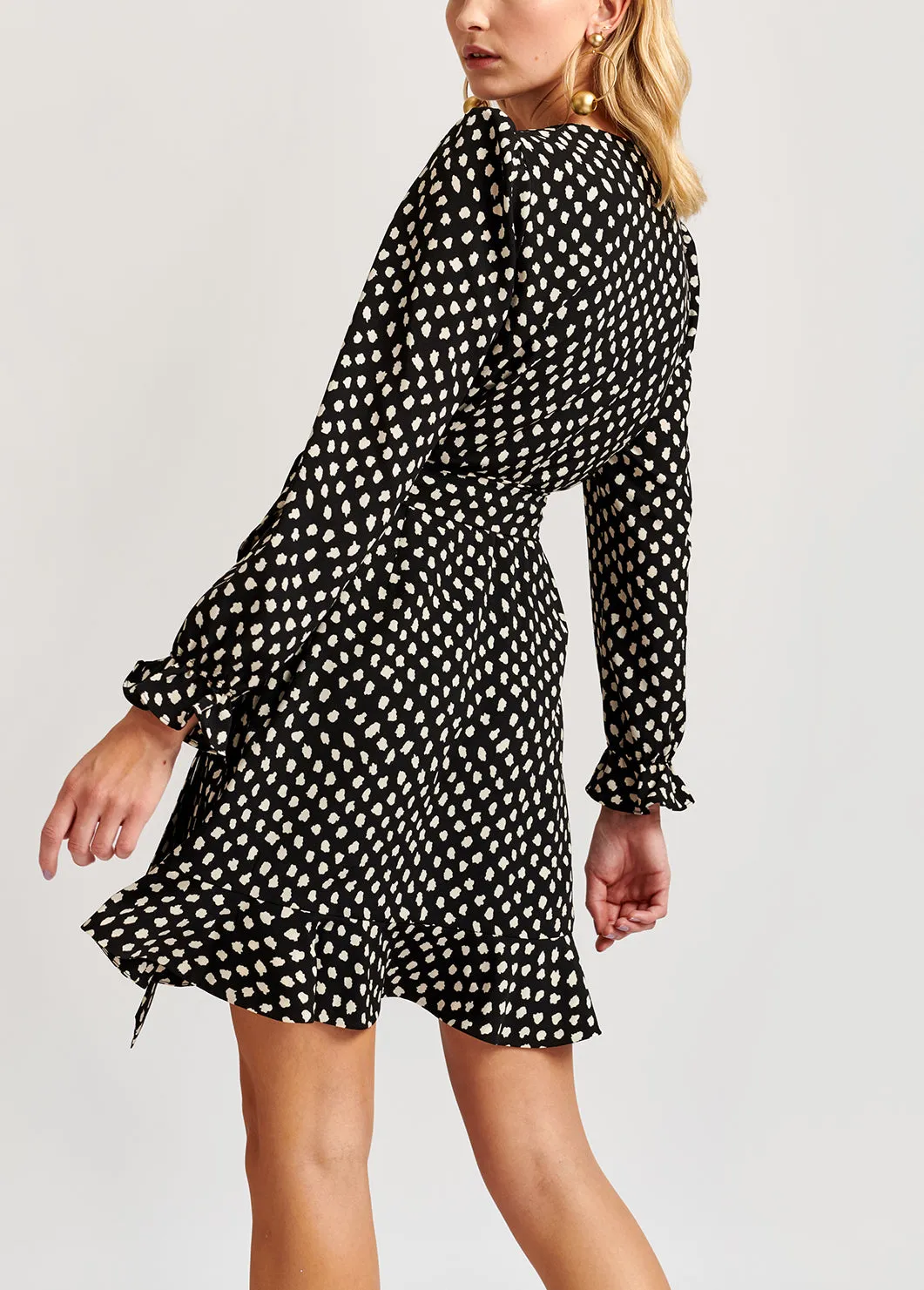 Black polka dot wrap mini dress