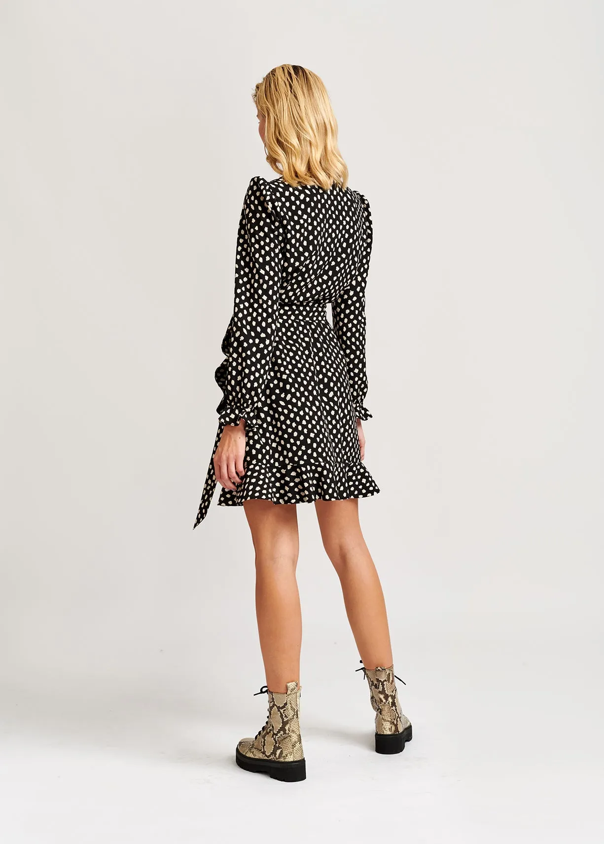 Black polka dot wrap mini dress